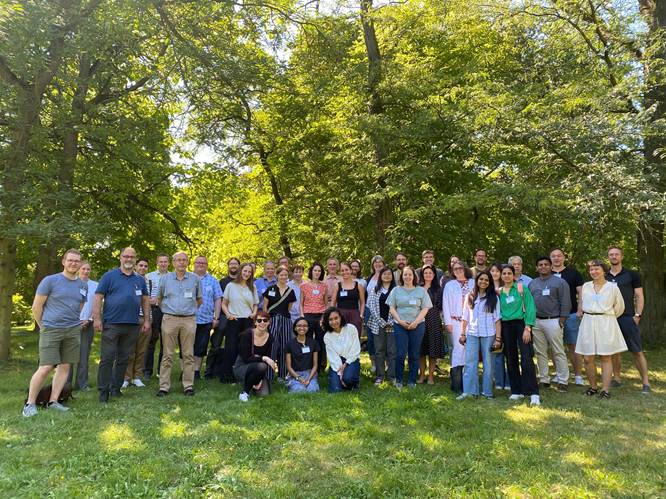 A group of people posing for a photo
AI-generated content may be incorrect.