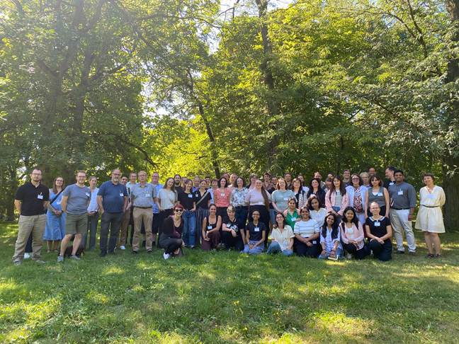 A group of people posing for a photo
AI-generated content may be incorrect.